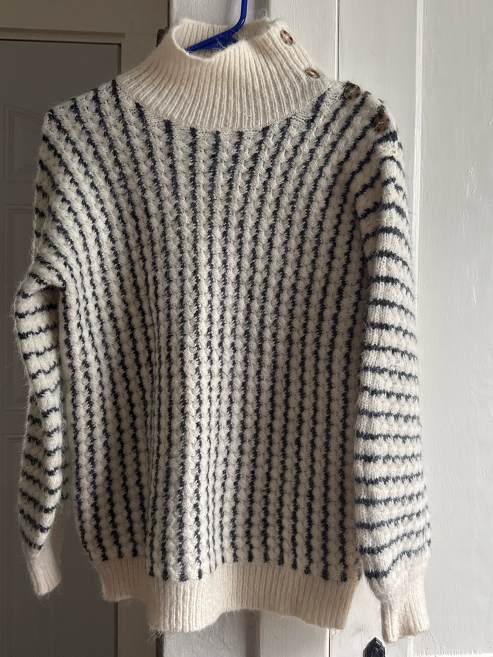 Cozy Cream Turtleneck Sweater with Navy Stripe Accents